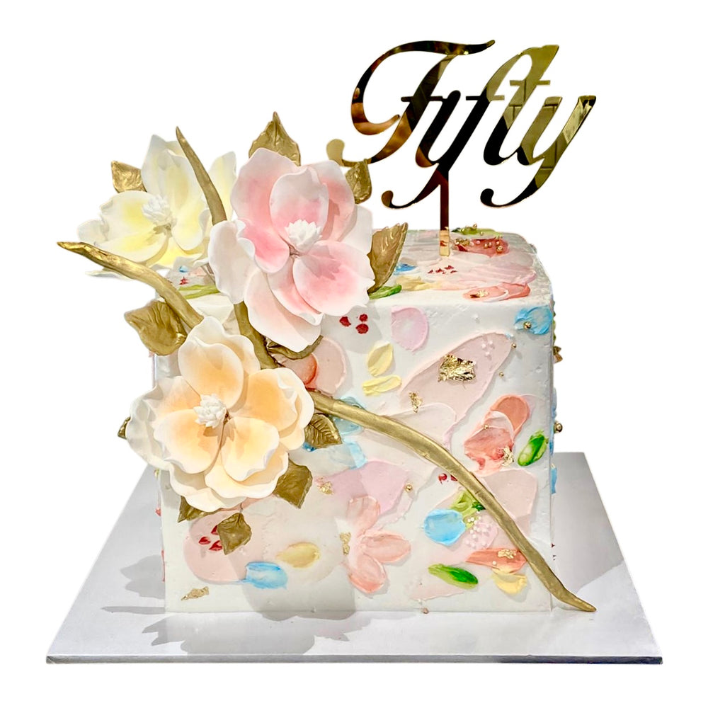 चौकोर कलात्मक लम्बे फूलों वाला केक